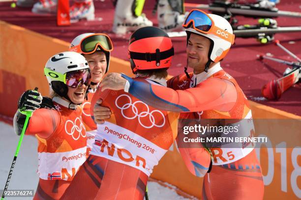 Norway's Kristin Lysdahl, Norway's Sebastian Foss-Solevaag, Norway's Nina Haver-Loeseth and Norway's Leif Kristian Nestvold-Haugen celebrate after...