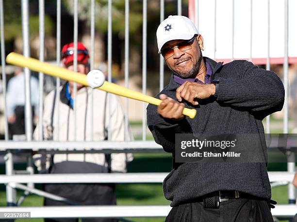 Major League Baseball player Gary Sheffield hits Wiffle ball pitches from former MLB pitcher Greg Maddux during the 2009 Maddux Harmon Celebrity...