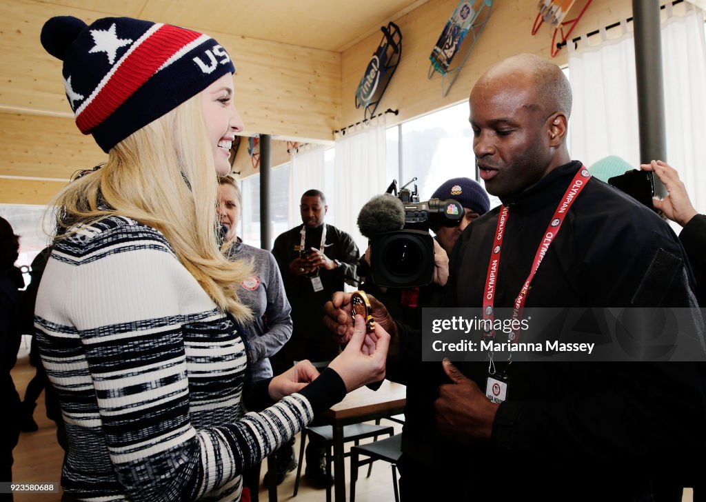 Ivanka Trump presents Garrett Hines with a medal from her father