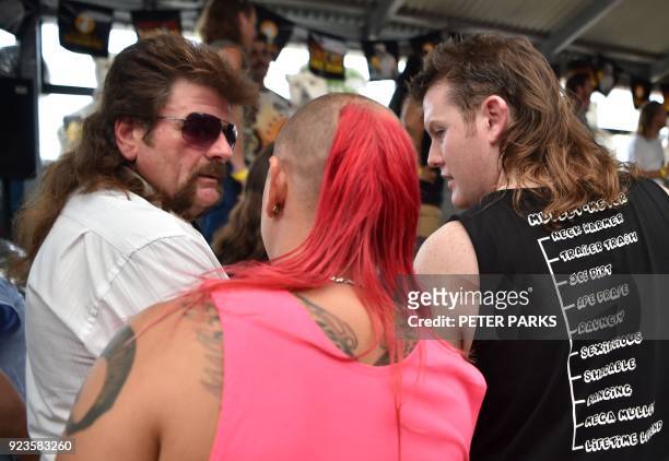Men wait to be judged on their mullet styles at Mulletfest 2018 in the town of Kurri Kurri, 150 kms north of Sydney on February 24, 2018. Mulletfest...