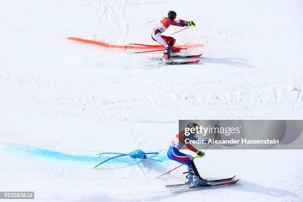 Ramon Zenhaeusern of Switzerland and Clement Noel of France compete during the Alpine Team Event semi final on day 15 of the PyeongChang 2018 Winter...