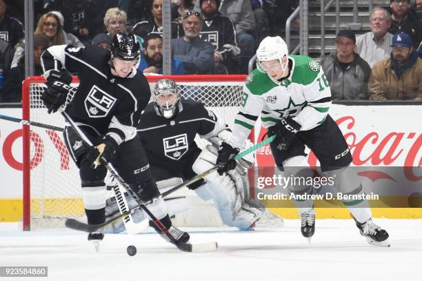 Dion Phaneuf of the Los Angeles Kings battles for the puck against Tyler Pitlick of the Dallas Stars at STAPLES Center on February 22, 2018 in Los...