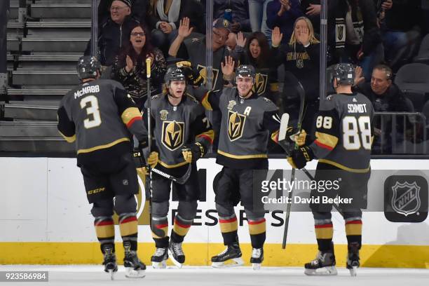 William Karlsson celebrates his goal with his teammates Brayden McNabb, Reilly Smith and Nate Schmidt of the Vegas Golden Knights against the...