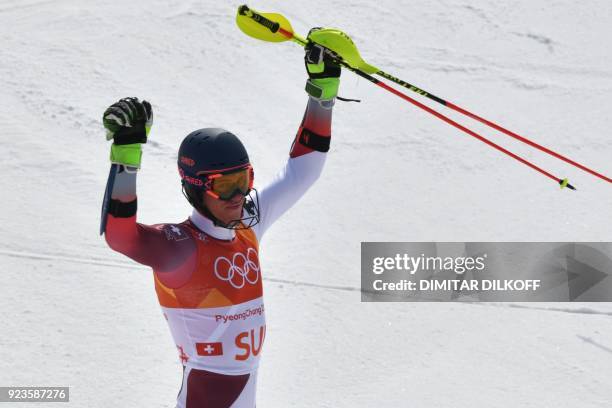 Switzerland's Ramon Zenhaeusern reacts after competing in the Alpine Skiing Team Event final at the Jeongseon Alpine Center during the Pyeongchang...