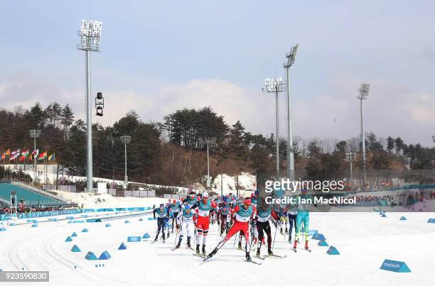 Alex Harvey of Canada leads out the Men's 50km Mass Start Classic at Alpensia Cross-Country Centre on February 24, 2018 in Pyeongchang-gun, South...