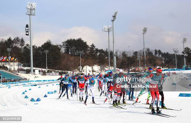 Alex Harvey of Canada leads out the Men's 50km Mass Start Classic at Alpensia Cross-Country Centre on February 24, 2018 in Pyeongchang-gun, South...