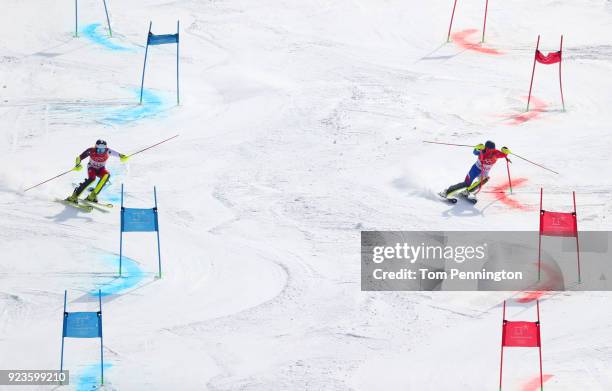 Daniel Yule of Switzerland and Alexis Pinturault of France compete during the Alpine Team Event Semifinals on day 15 of the PyeongChang 2018 Winter...