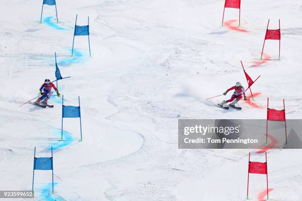 Tessa Worley of France and Wendy Holdener of Switzerland compete during the Alpine Team Event Semifinals on day 15 of the PyeongChang 2018 Winter...