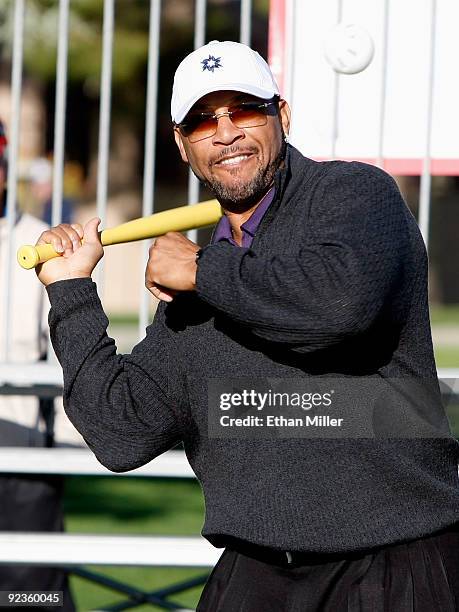 Major League Baseball player Gary Sheffield hits Wiffle ball pitches from former MLB pitcher Greg Maddux during the 2009 Maddux Harmon Celebrity...