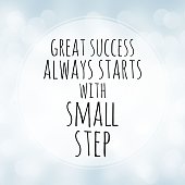 Great success always starts with small step - motivation quote on white bokeh background