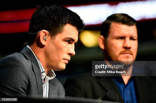 Commentators Dominick Cruz and Michael Bisping wait on the FOX television desk during the UFC Fight Night Weigh-ins at Amway Center on February 23,...
