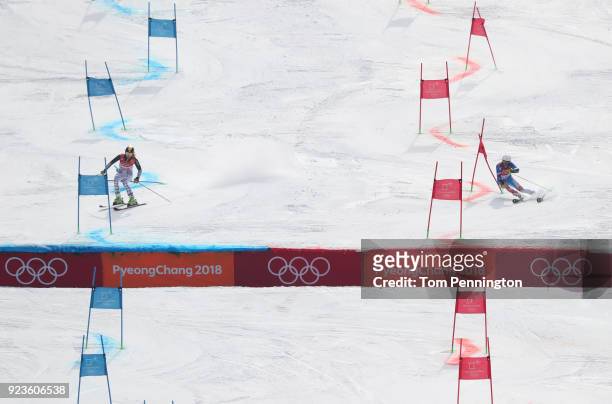 Lena Duerr of Germany and Veronika Velez Zuzulova of Slovakia compete during the Alpine Team Event 1/8 Finals on day 15 of the PyeongChang 2018...