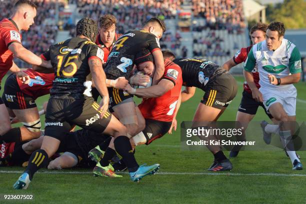 Matt Todd of the Crusaders dives over to score a try during the round two Super Rugby match between the Crusaders and the Chiefs at AMI Stadium on...