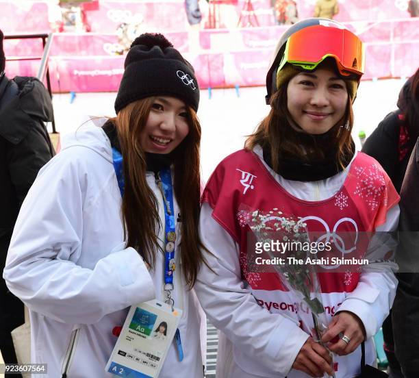 Asami Hirono and Yuka Fujimori of Japan pose for photographs after the Snowboard Ladies' Big Air Final on day thirteen of the PyeongChang Winter...