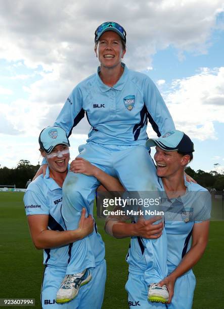 Alex Blackwell of NSW is chaired from the field after winning the WNCL Final match between New South Wales and Western Australia at Blacktown...