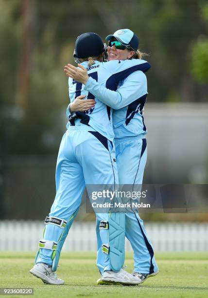 Allyssa Healy and Alex Blackwell of NSW embrace after winning the WNCL Final match between New South Wales and Western Australia at Blacktown...