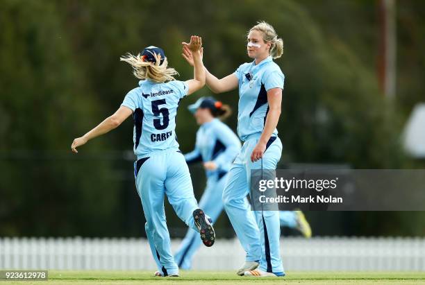 Ellyse Perry of NSW celebrates taking a wicket during the WNCL Final match between New South Wales and Western Australia at Blacktown International...