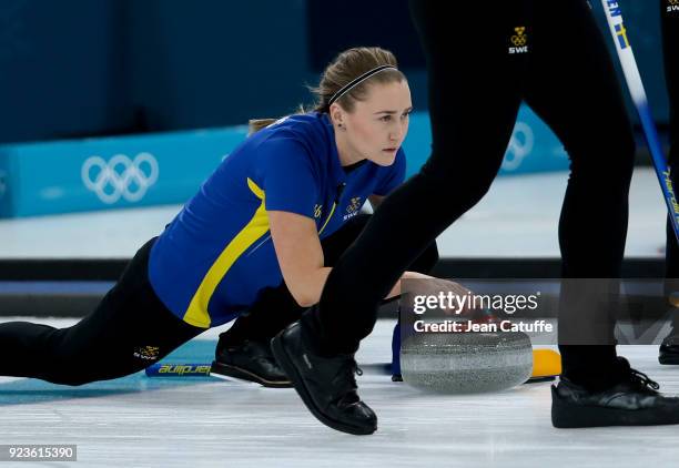 Sara McManus of Sweden throws a stone during the women's curling semifinal game between Sweden and Great Britain on day fourteen of the 2018 Winter...