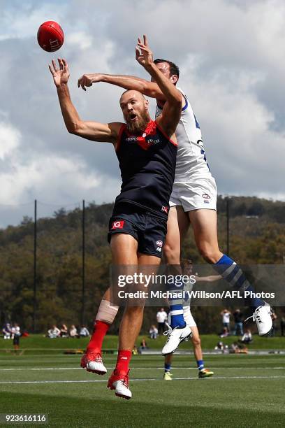 Max Gawn of the Demons and Todd Goldstein of the Kangaroos compete for the ball during the AFL 2018 JLT Community Series match between the North...
