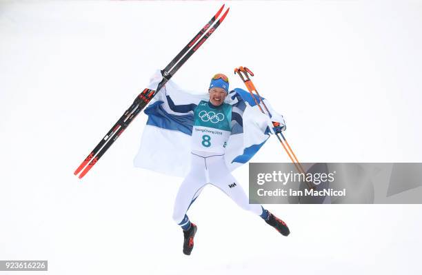 Iivo Niskanen of Finland celebrates winning the Men's 50km Mass Start Classic at Alpensia Cross-Country Centre on February 24, 2018 in...