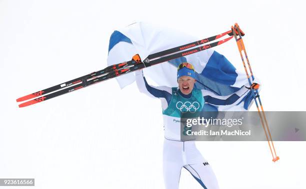 Iivo Niskanen of Finland celebrates winning the Men's 50km Mass Start Classic at Alpensia Cross-Country Centre on February 24, 2018 in...
