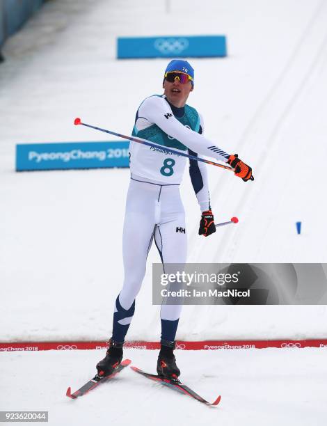 Iivo Niskanen of Finland celebrates winning the Men's 50km Mass Start Classic at Alpensia Cross-Country Centre on February 24, 2018 in...