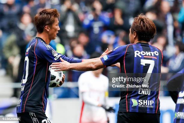 Nagasawa Shun of Gamba Osaka celebrates his scoring with teammates during the J.League J1 match between Gamba Osaka and Nagoya Grampus at Suita City...