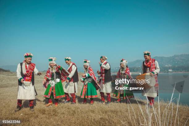 group of kinnaur tribal people dancing together in a group. - tribal dancing stock pictures, royalty-free photos & images