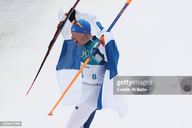 Iivo Niskanen of Finland celebrates winning the gold medal during the Men's 50km Mass Start Classic on day 15 of the PyeongChang 2018 Winter Olympic...