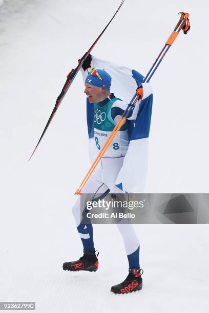 Iivo Niskanen of Finland celebrates winning the gold medal during the Men's 50km Mass Start Classic on day 15 of the PyeongChang 2018 Winter Olympic...