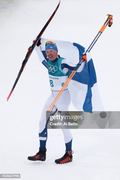 Iivo Niskanen of Finland celebrates winning the gold medal during the Men's 50km Mass Start Classic on day 15 of the PyeongChang 2018 Winter Olympic...