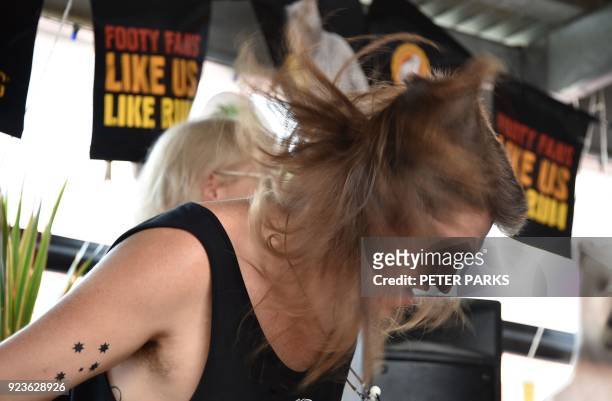 Contestant shows off his mullet haircut at Mulletfest 2018 in the town of Kurri Kurri, 150 kms north of Sydney on February 24, 2018. Mulletfest is a...