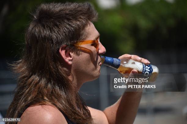 Man shows off his mullet haircut at Mulletfest 2018 in the town of Kurri Kurri, 150 kms north of Sydney on February 24, 2018. Mulletfest is a...