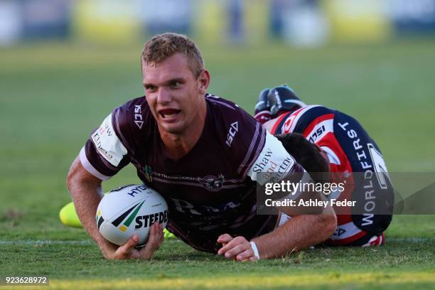 Tom Trbojevic of the Sea Eagles scores a try during the NRL Trial match between the Manly Sea Eagles and the Sydney Roosters at Central Coast Stadium...