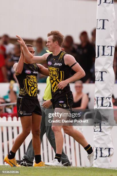 Jack Riewoldt of the Tigers celebreates a goal during the JLT Community Series AFL match between the Essendon Bombers and the Richmond Tigers at Norm...