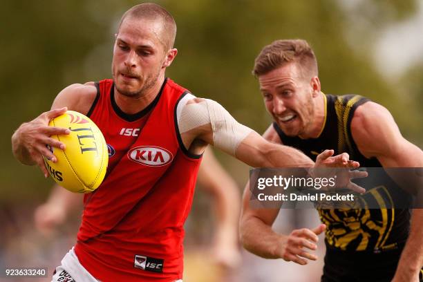 David Zaharakis of the Bombers kicks the ball during the JLT Community Series AFL match between the Essendon Bombers and the Richmond Tigers at Norm...