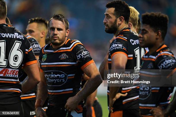 Josh Reynolds of the Tigers looks on during the NRL trial match between the Cronulla Sharks and the Wests Tigers at Campbelltown Sports Stadium on...