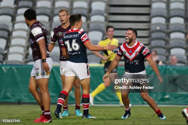 James Tadesco of the Roosters celebrates his try during the NRL Trial match between the Manly Sea Eagles and the Sydney Roosters at Central Coast...