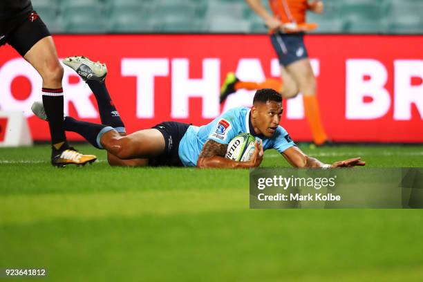 Israel Folau of the Waratahs scores a try during the round two Super Rugby match between the Waratahs and the Stormers at Allianz Stadium on February...