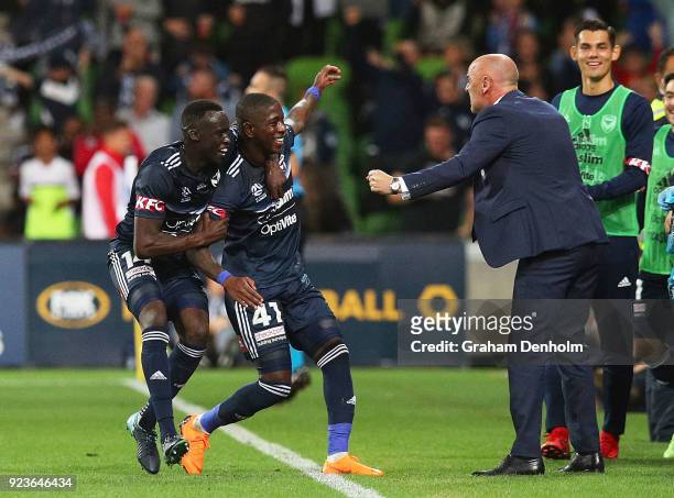 Leroy George of the Victory celebrates his goal with Melbourne Victory Head Coach Kevin Muscat during the round 21 A-League match between the...