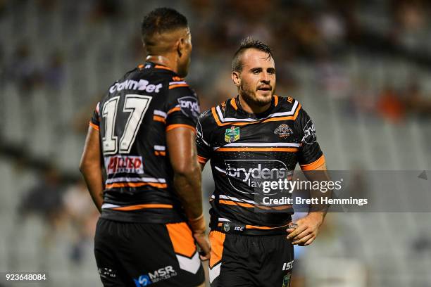 Josh Reynolds of the Tigers looks on during the NRL trial match between the Cronulla Sharks and the Wests Tigers at Campbelltown Sports Stadium on...