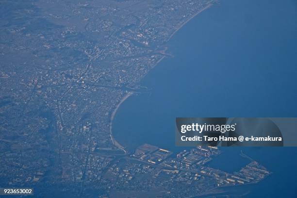 mikawa bay and tsu city in mie prefecture in japan daytime aerial view from airplane - tsu stock pictures, royalty-free photos & images