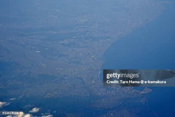 mikawa bay and tsu city in mie prefecture in japan daytime aerial view from airplane - tsu stock pictures, royalty-free photos & images