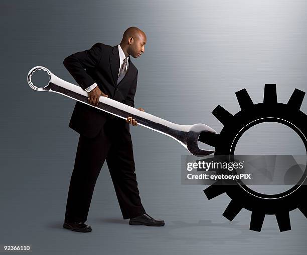 tourner un équipement - manivelle photos et images de collection