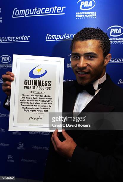 Jason Robinson revieves a Guinness World of Records certificate at the PRA Computercenter Rugby Players awards held at the Nursery Pavillion Lord's...