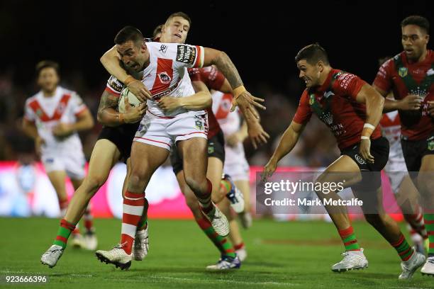 Paul Vaughan of the Dragons is tackled during the NRL trial match between the South Sydney Rabbitohs and the St George Illawarra Dragons at Glen...