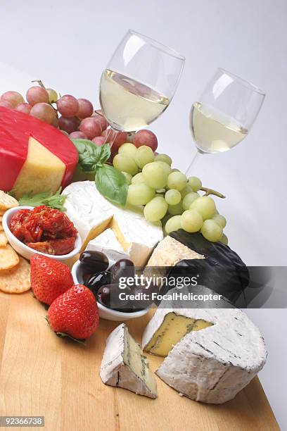 cheese platter on an angle - wax fruit stock pictures, royalty-free photos & images