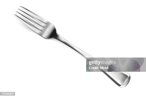 a four fingered stainless steel fork made in sheffield - vork stockfoto's en -beelden