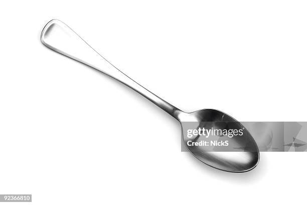 isolated spoon shining on white - spoon stock pictures, royalty-free photos & images