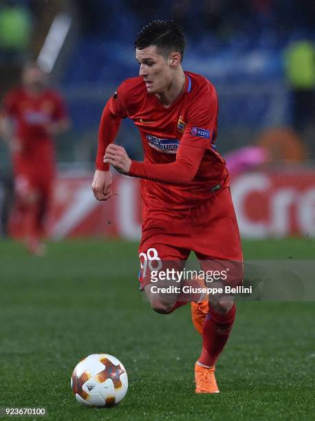 Dennis Man of Fotbal Club FC Steaua Bucarest in action during UEFA Europa League Round of 32 match between Lazio and Steaua Bucharest at the Stadio...